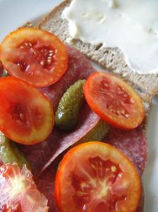 Salami. tomato and gherkin sandwich
