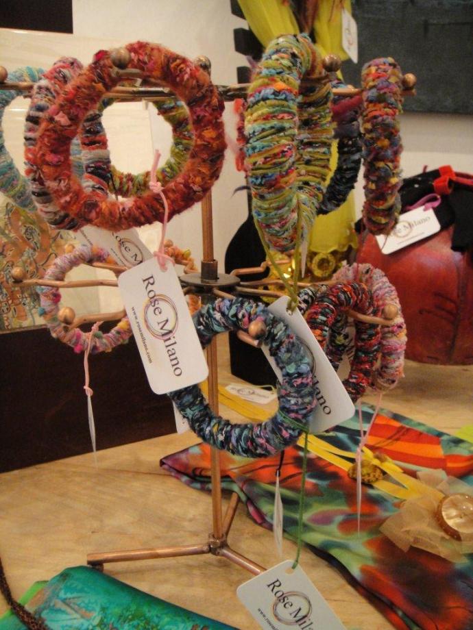 Jewellery made with tactile textiles.