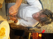 Giorgio Locatelli shaving truffles over pasta