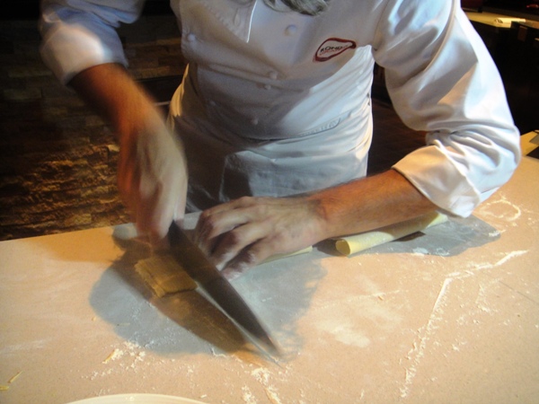 Cutting the pasta into strips