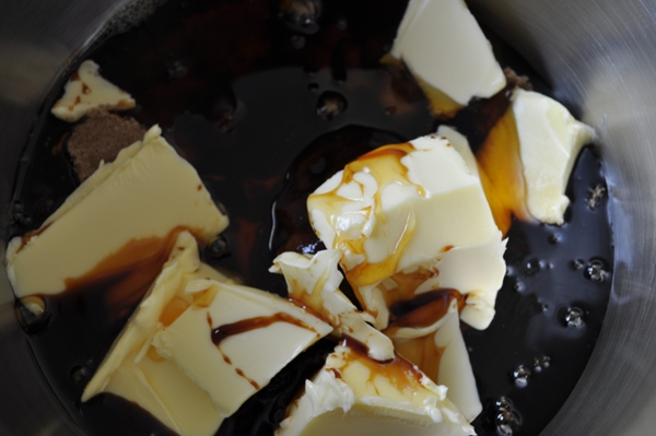 Melting butter, sugar, treacle and golden syrup