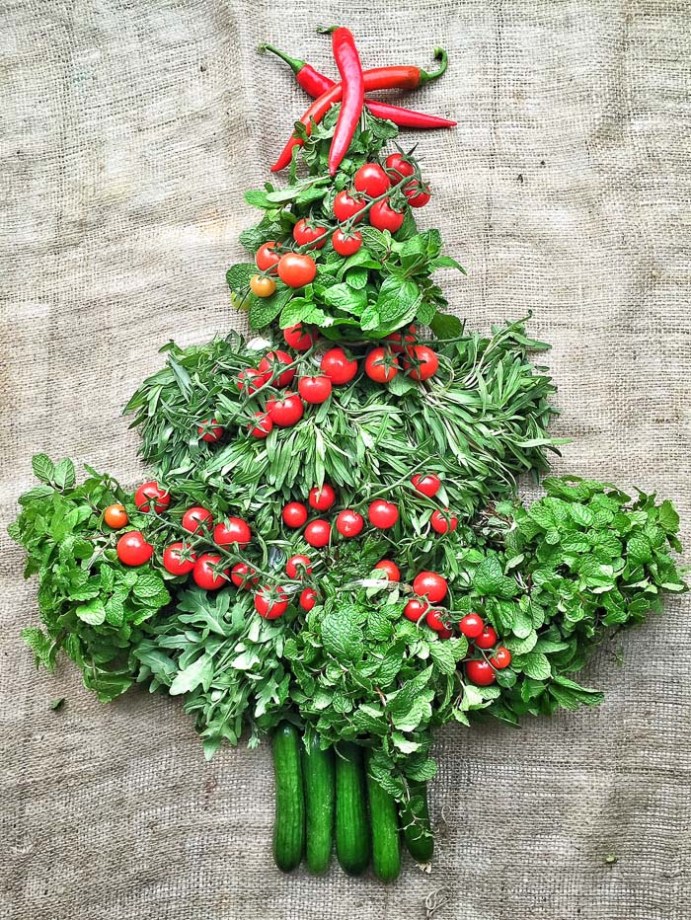 Farmers market haul doubling as table decorations for our Christmas feast. Christmas tree of farmers market produce In my kitchen on mycustardpie