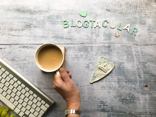 Keyboard, cup of tea, heart and Blogtacular in letters