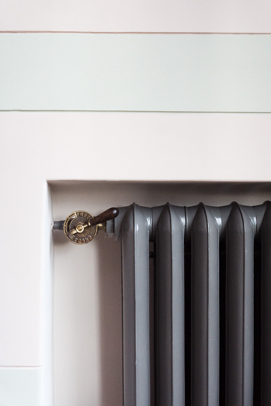 Brass control on a traditional radiator