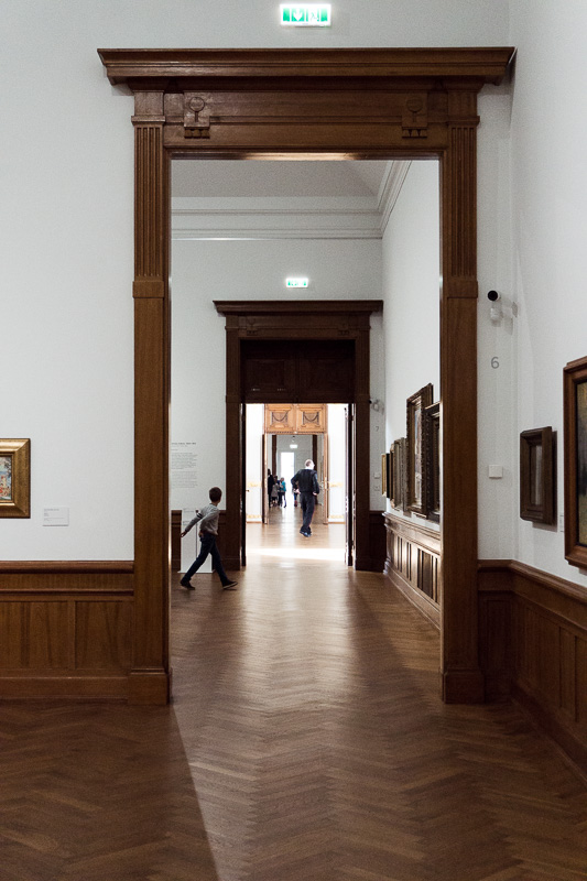 view through a door way down a corridor