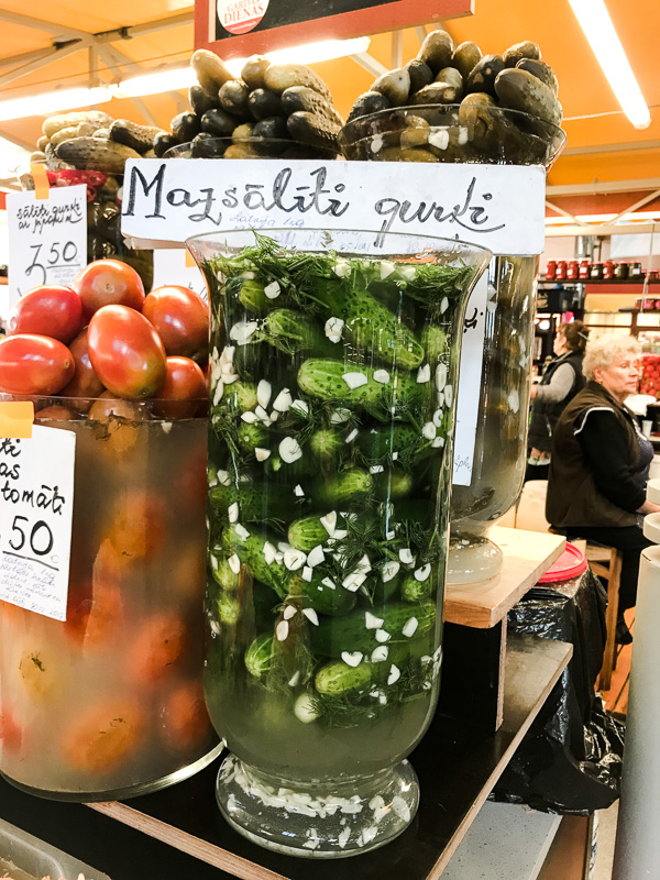 A jar full of cucumber pickles