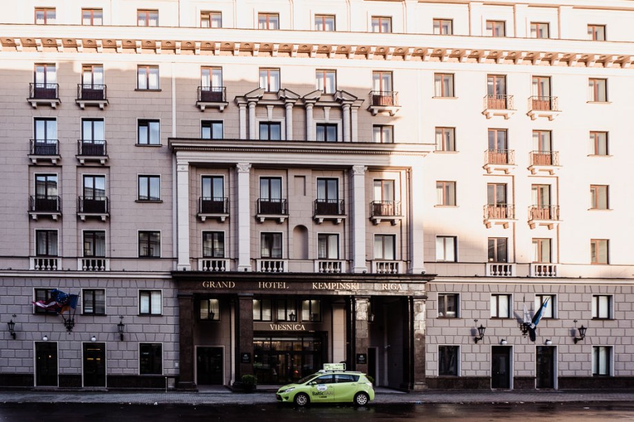 Front of hotel with green car outside