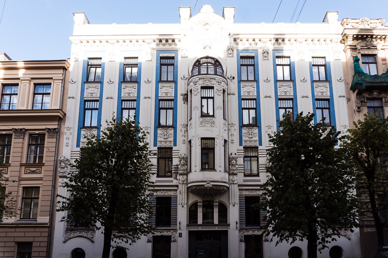 blue and white art nouveau building in riga latvia
