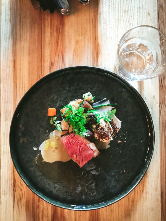 beef ribs and Salad in cafe in riga