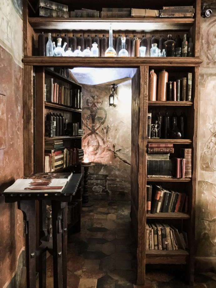 Book shelves and stairs to basement