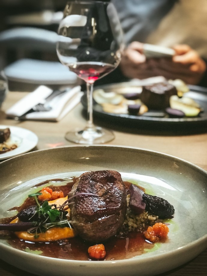 Meat and carrots on plate