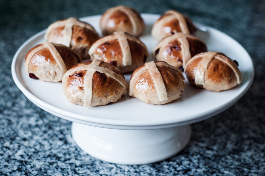 hot cross buns on a cake stand