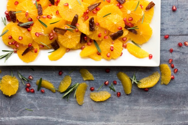 Date and orange fruit salad on a plate