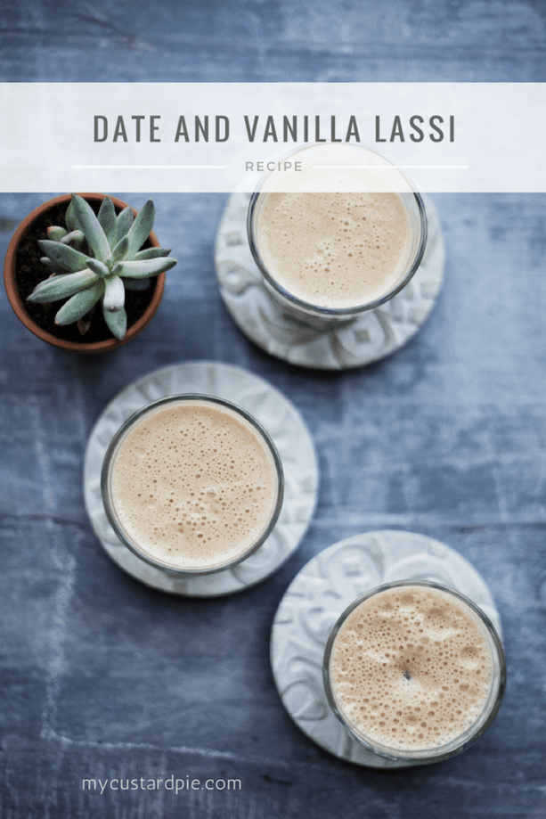 Three glasses of frothy date and vanilla lassi