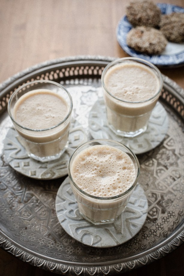 three glasses of lassi on a tray