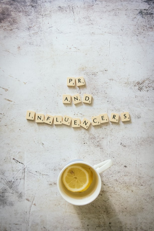 Scrabble letters and a cup of tea