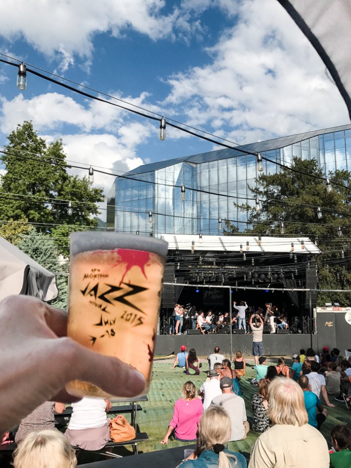 Glass of wine in front of a stage