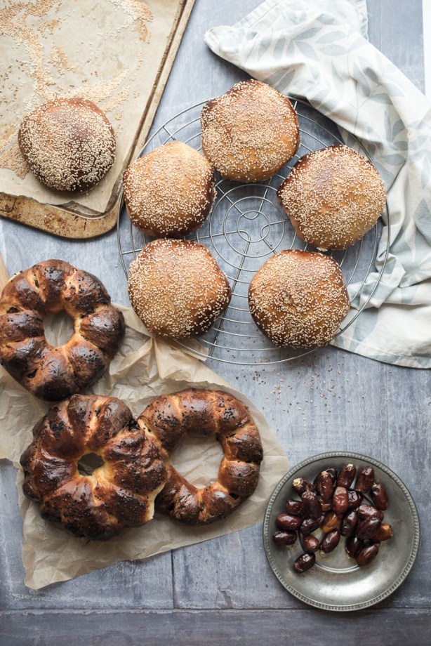 A variety of date breads and a plate of dates
