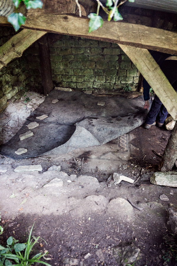 A tarpaulin covering a mosaic