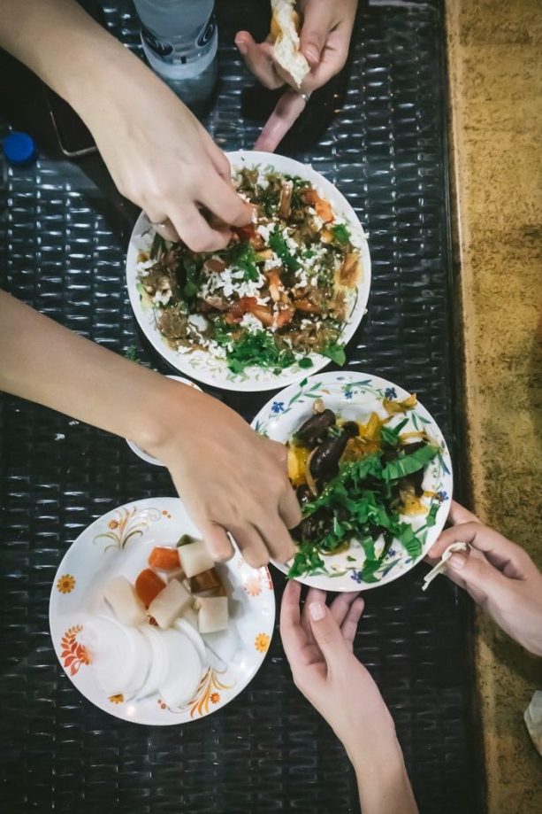 eating Sudanese food with our hands
