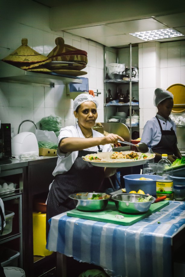 a cook in an Ethiopian restaurant kitchen in Dubai