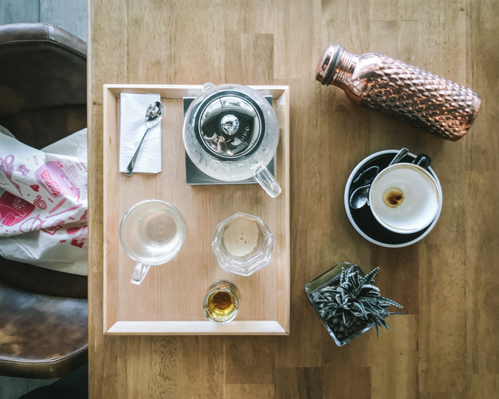 a tea tray and a reusable bottle