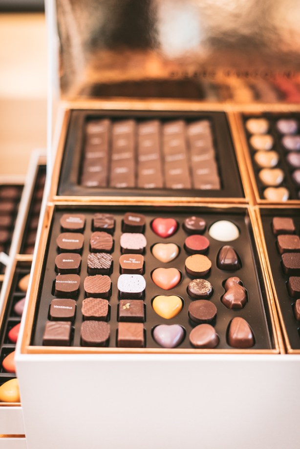 A large box with drawers of Pierre Marcolini chocolates