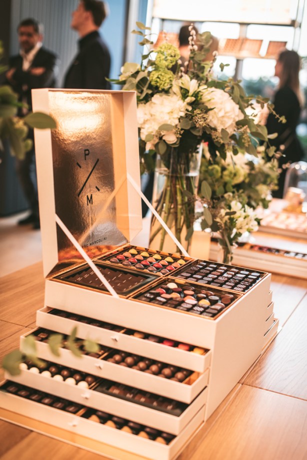 A large box with drawers of Pierre Marcolini chocolates