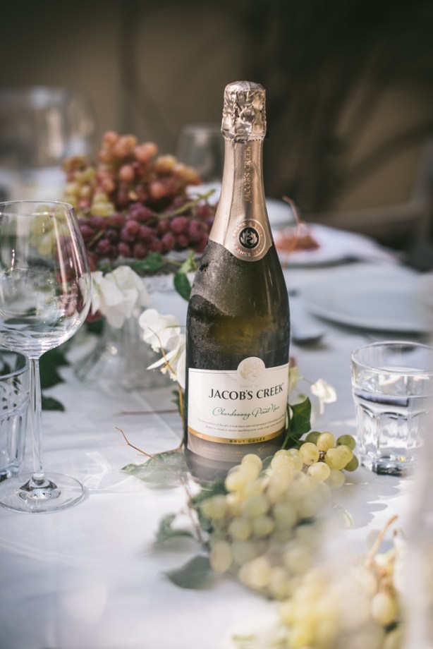 Bottle of Jacobs Creek on the Dinner table in the garden