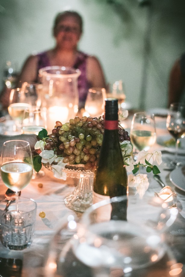 Table in the garden with lots of wine glasses