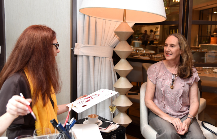 Hatty Pedder artist painting a lady (me)