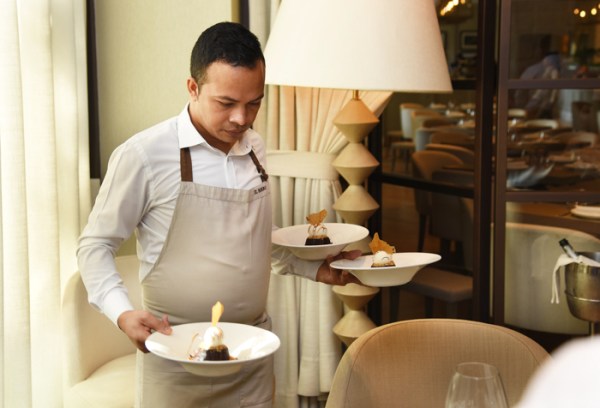 waiter holding plates
