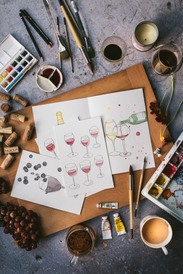 paintings of wine on an artists board