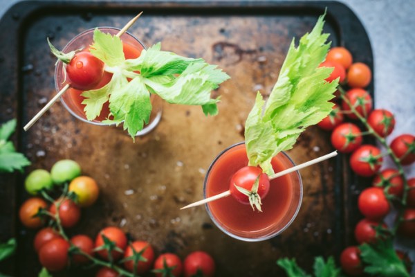 glasses of Bloody Mary and lots of tomatoes 