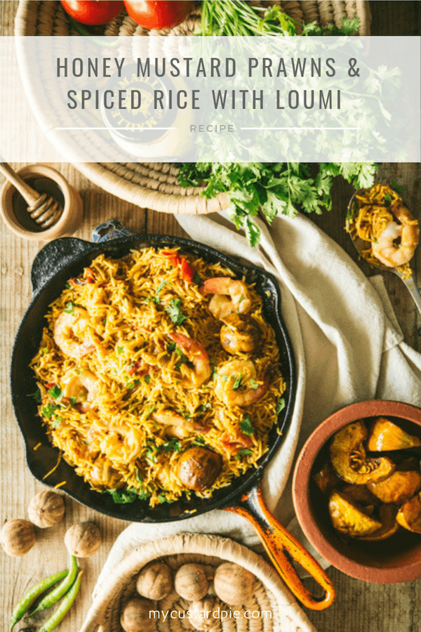 skillet with rice and honey mustard prawns with ingredients coriander and loumi