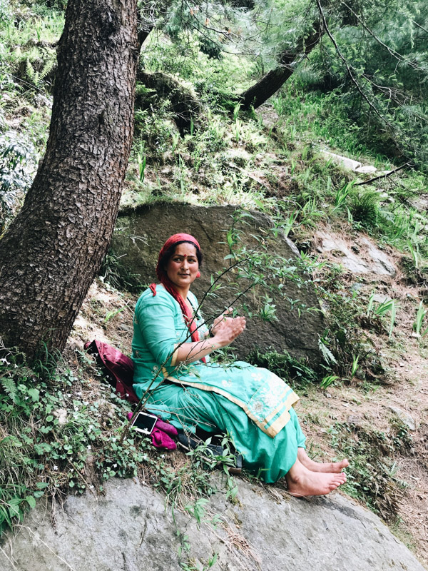 Lady sitting under a tree