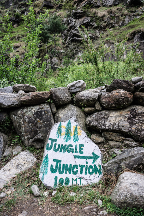 sign painted on rock