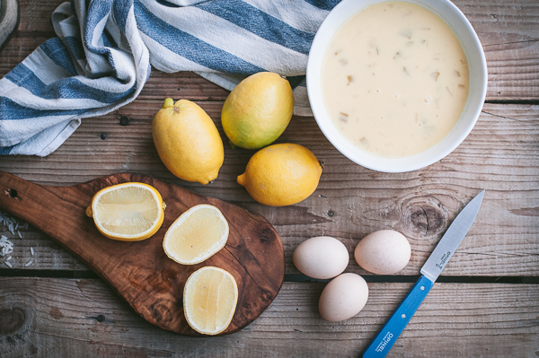 avgolemono soup with ingredients eggs and lemons
