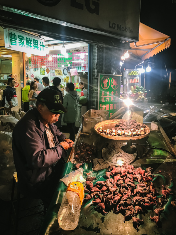 man with water chestnuts