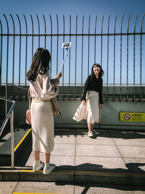 girls taking a photo