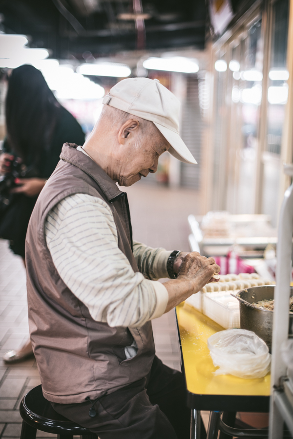 man making dumplings