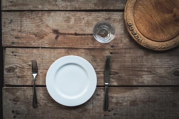 plate,knife, fork, glass, bread board