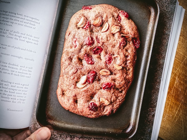 Whole wheat, tomato and garlic focaccia in a book