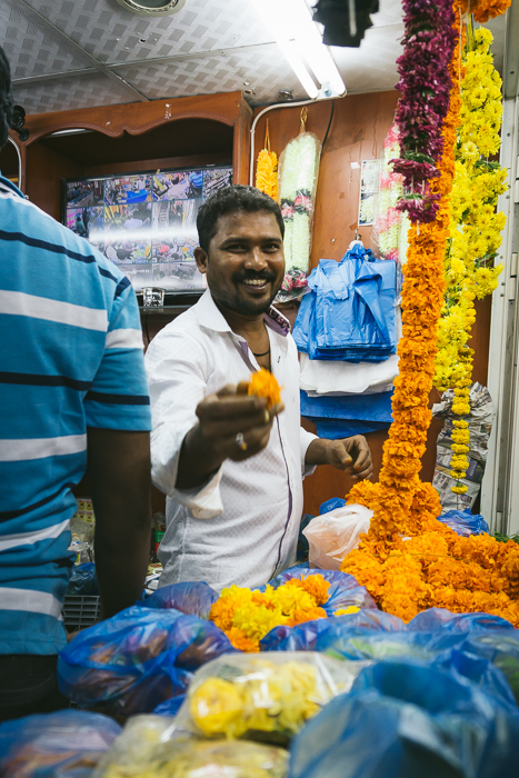 man holding marigold