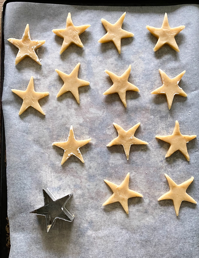 biscuit dough in star shapes