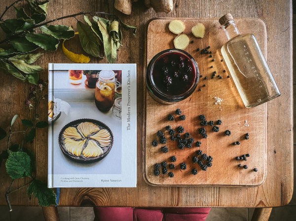 The Modern Preserver's Kitchen cookbook and some ingredients