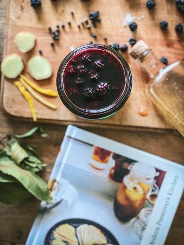 The Modern Preserver's Kitchen cookbook and some ingredients